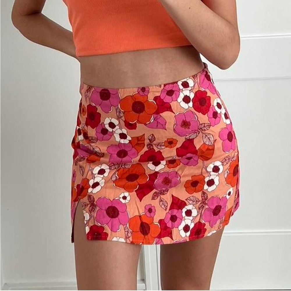 Urban Outfitters mini skirt featuring orange & pink floral pattern